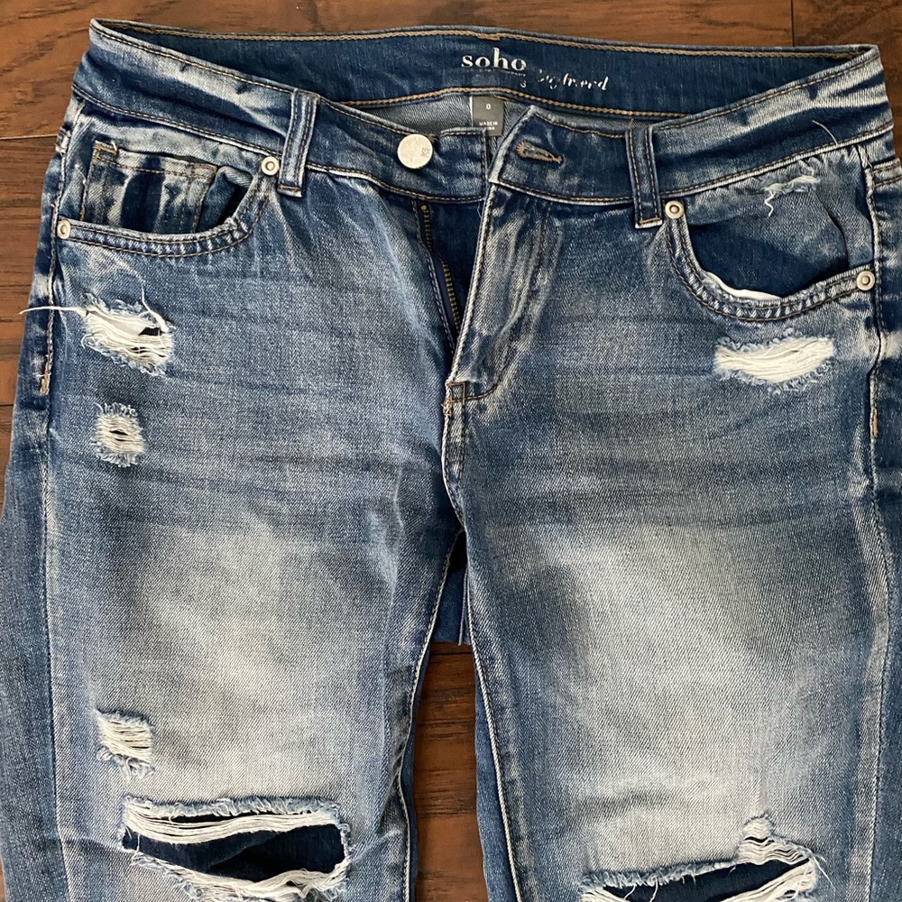 “ripped” jeans